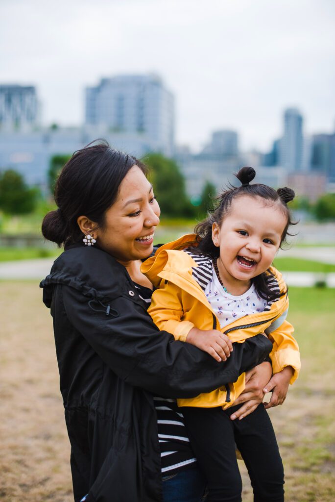 mother and daughter in city park