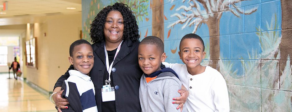 teacher with students shareourstrength.org